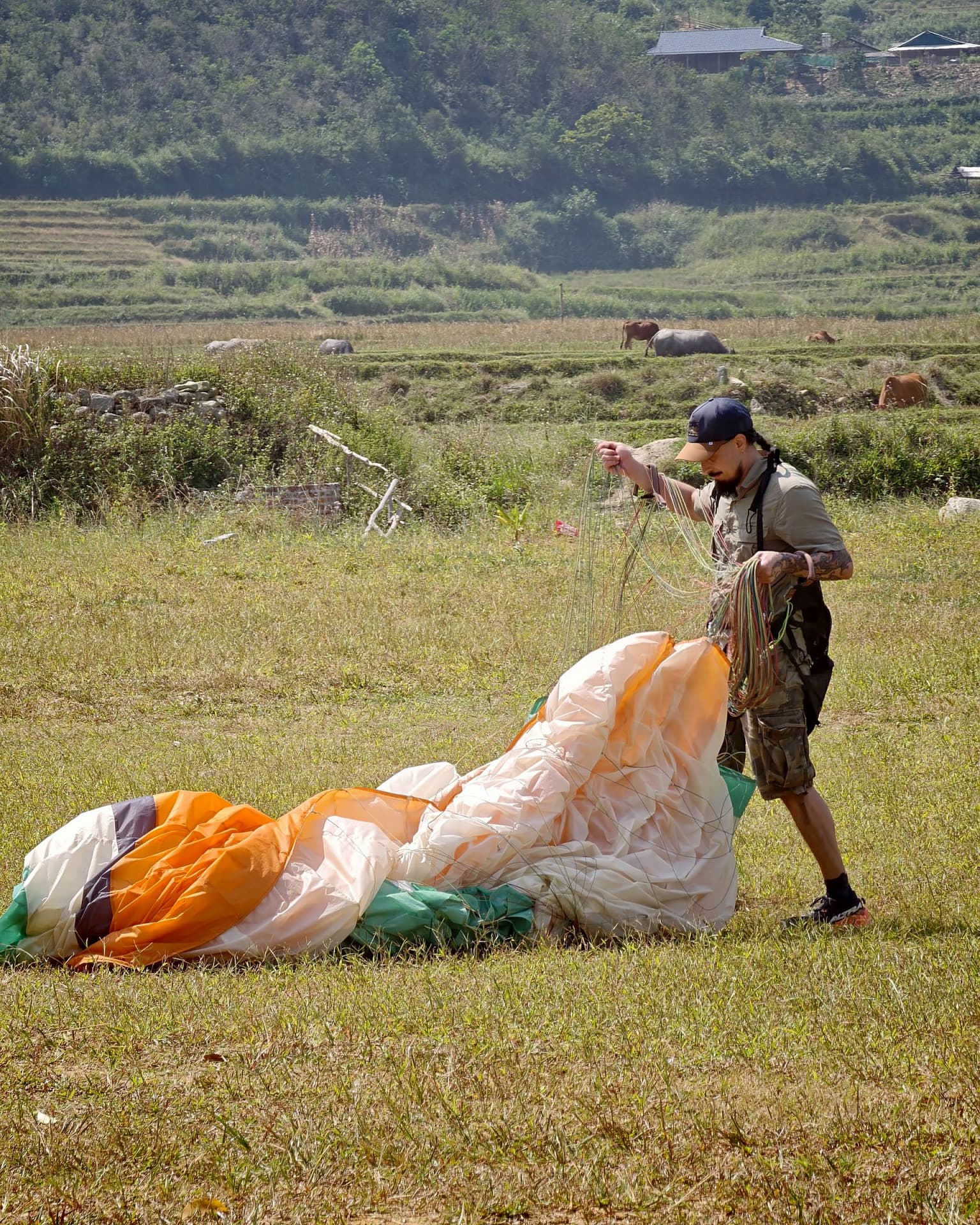 After bringing the wing down: gather the lines and keep it flat.