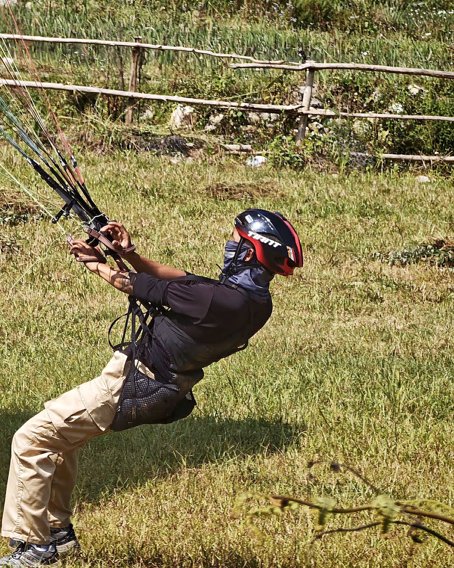 Step 1: facing the wing, lean back and pull the As with your body.